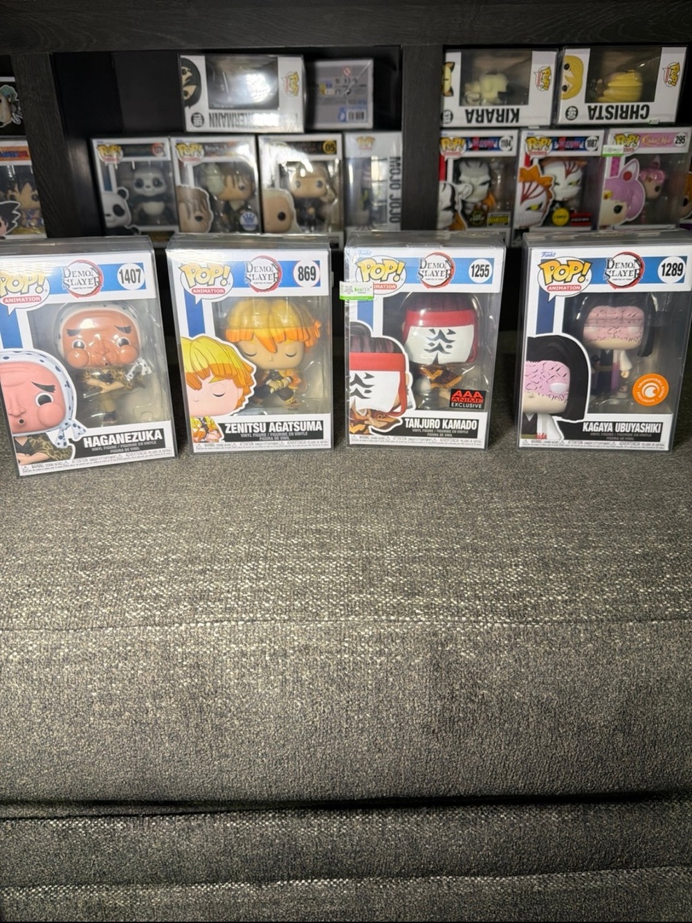 Funko Pop! Demon Slayer Set with Orange, Yellow, Red, Pink Details